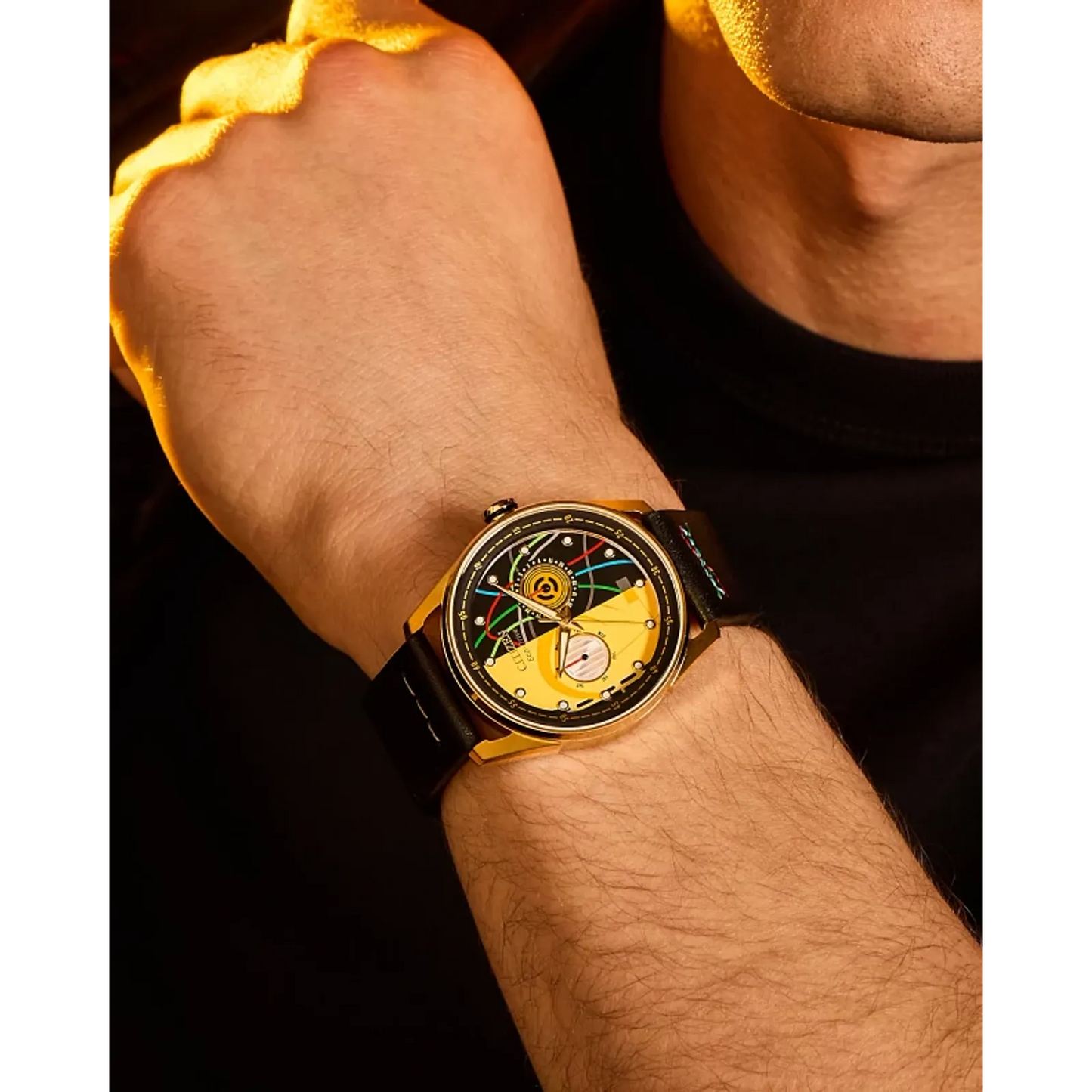 CITIZEN Star Wars C-3PO Rewired BU4026-05W – gold-tone Eco-Drive watch with yellow dial, C-3PO-inspired details, black leather strap with colorful stitching, and WR100 water resistance.
