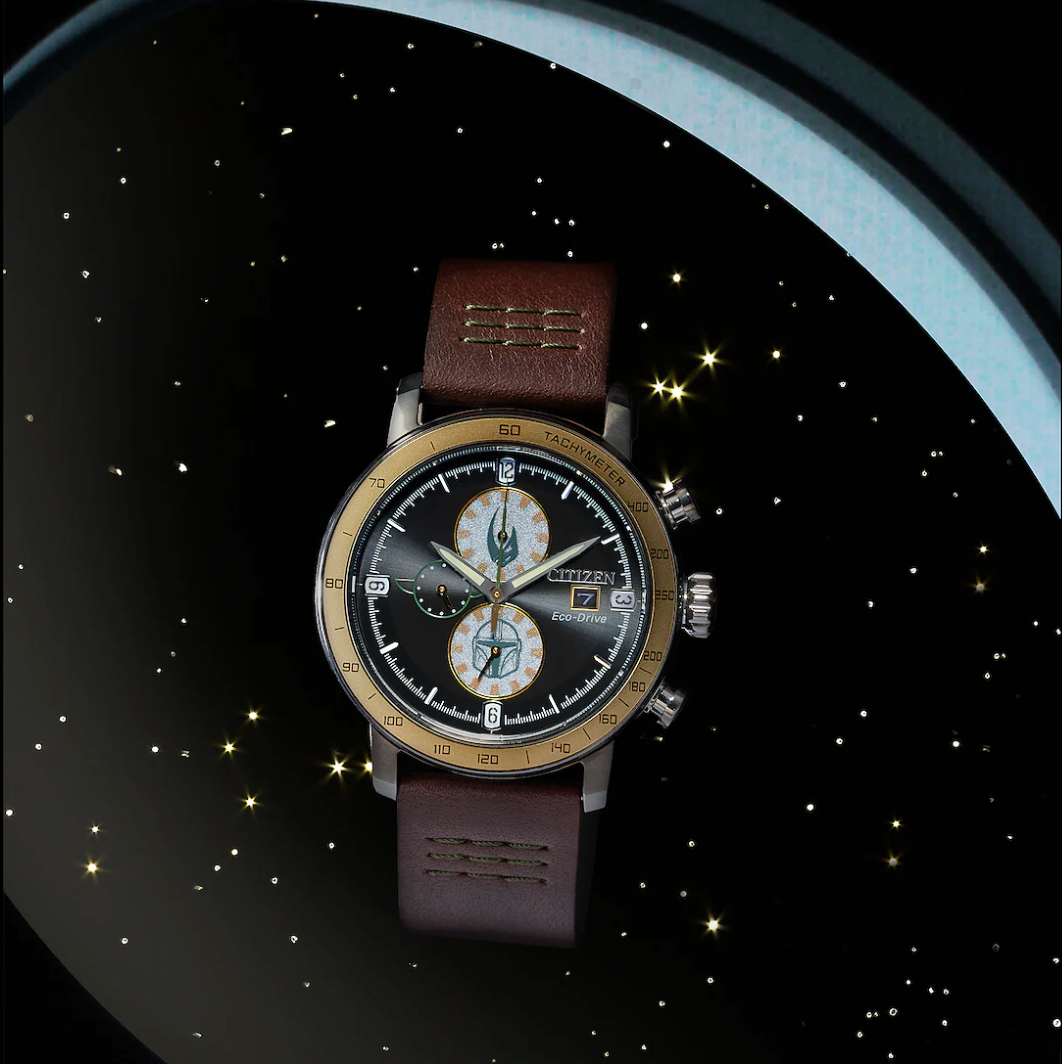 Watch with a brown leather strap on a starry background