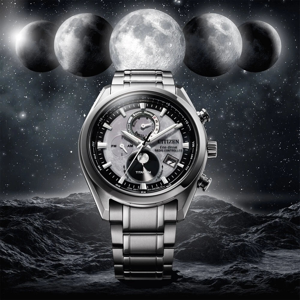 Silver watch with detailed face against a space-themed background with planets