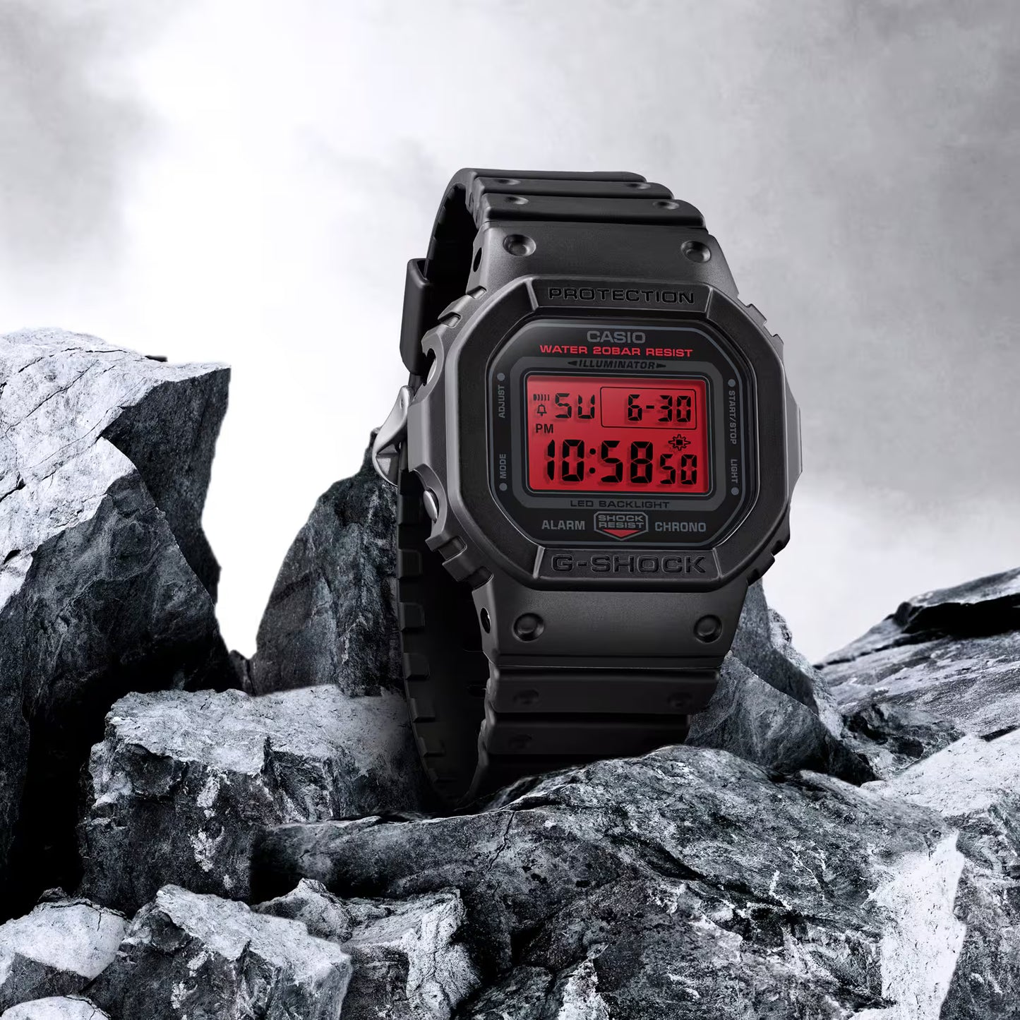 Black Casio G-Shock digital watch on a rocky background