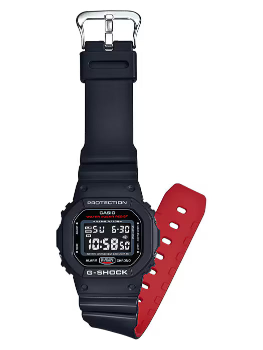 G-Shock digital watch with black case and red strap on a white background