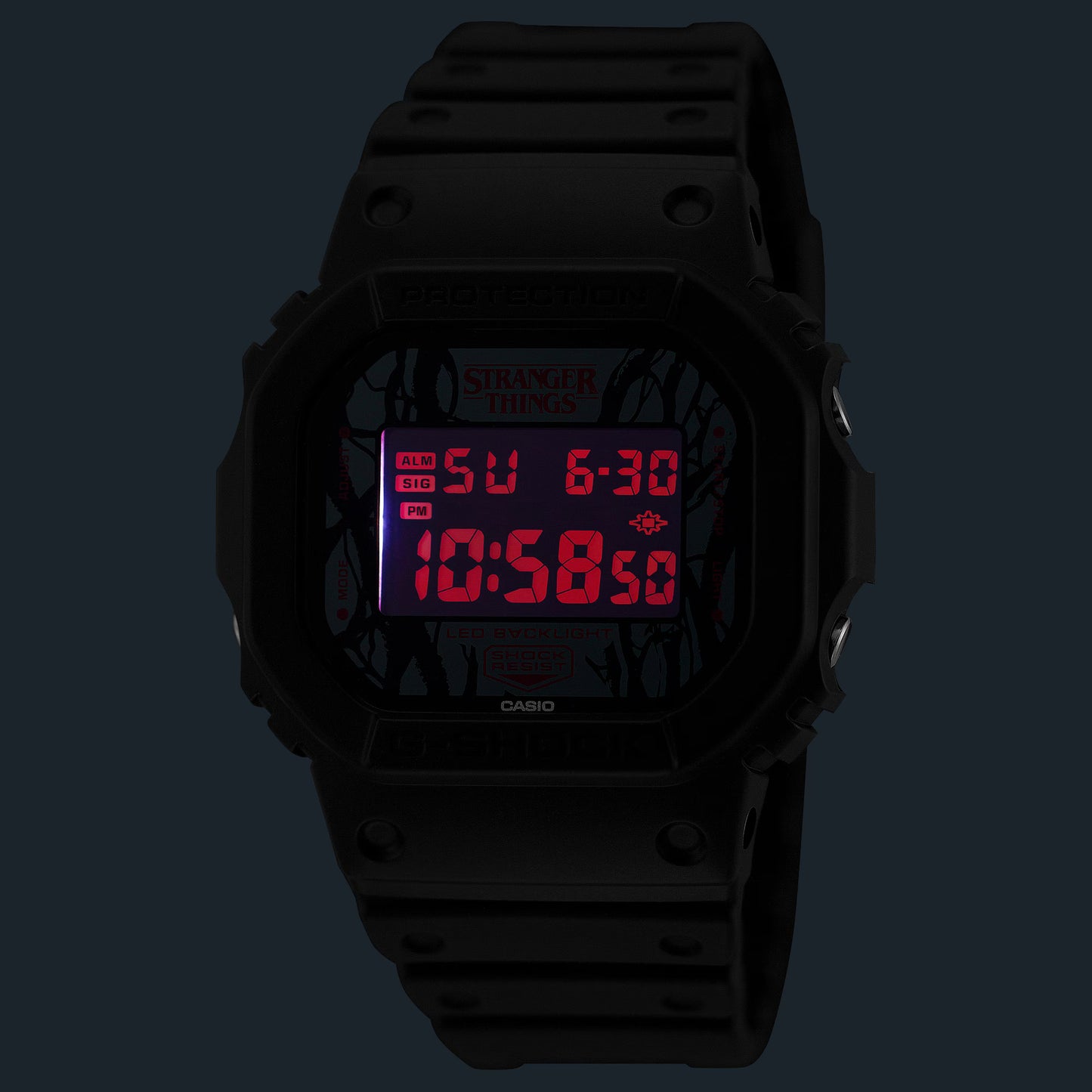 G-SHOCK DW5600STT-1 Stranger Things collaboration featuring vine-pattern dial inspired by Vecna, upside-down ‘A’ detail, red LED backlight, ‘011’ band loop tribute, bio-based black resin case and band, and special Demogorgon-themed packaging.”