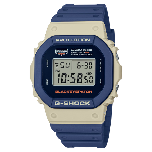 Casio G-Shock DW5610BEP-2, a collaboration with Tokyo streetwear brand BlackEyePatch. Features industrial navy and beige design with orange accents, shock-resistant build, 200m water resistance, bio-based resin band, and LED backlight with “Genuine Article” logo.