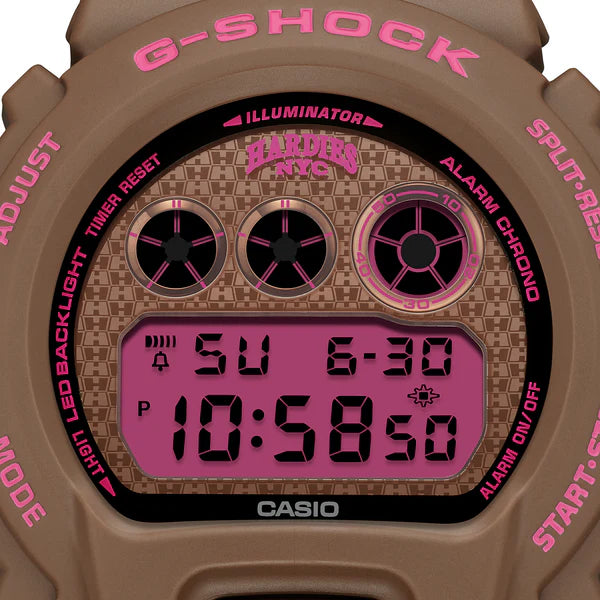 Casio G-Shock watch with pink text and display on a white background