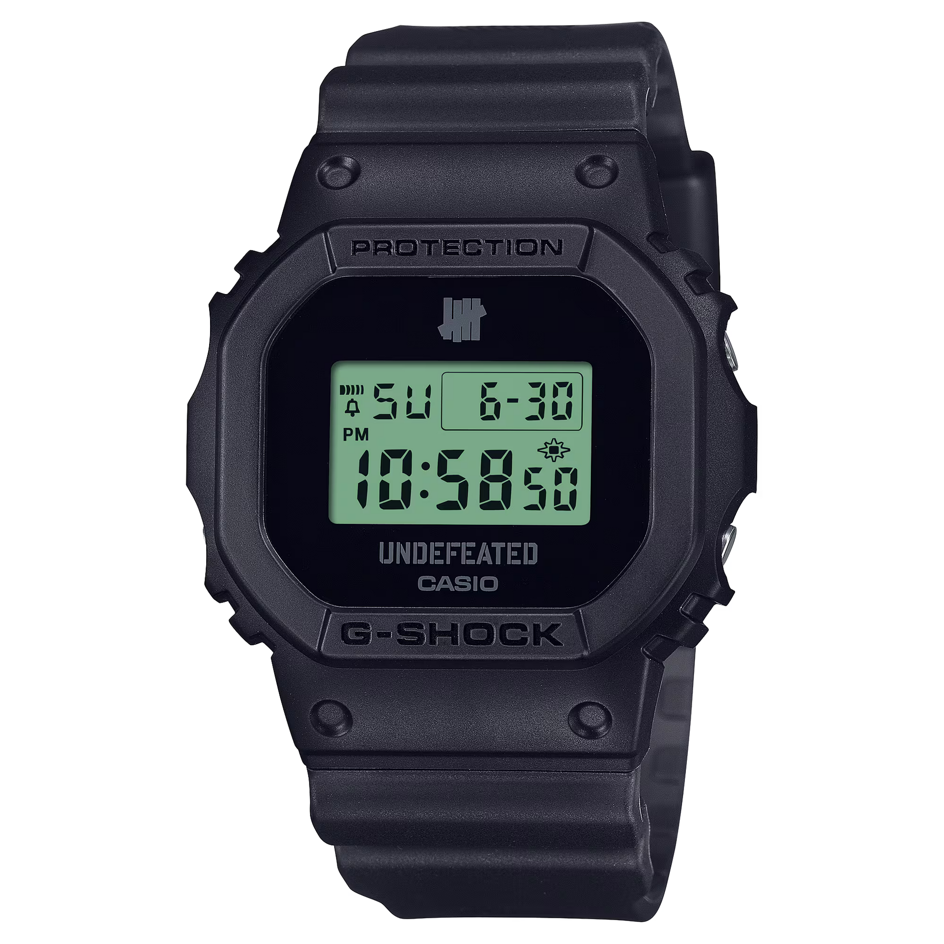Casio G-SHOCK DWE5600UD-1 UNDEFEATED collaboration model with matte black Carbon Core Guard case, semi-translucent resin band featuring UNDEFEATED logo, green LCD display, engraved caseback, and special packaging. Includes two interchangeable camouflage straps (tiger camo, storm camo). Features shock resistance, mineral glass, 200m water resistance, LED Super Illuminator backlight, stopwatch, countdown timer, alarms, flash alert, auto-calendar, and ±15 sec/month accuracy. Case size 48.9 × 43.8 × 13.7 mm, we