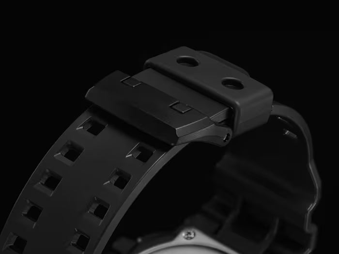 Close-up of a black watch strap with buckle on a transparent background