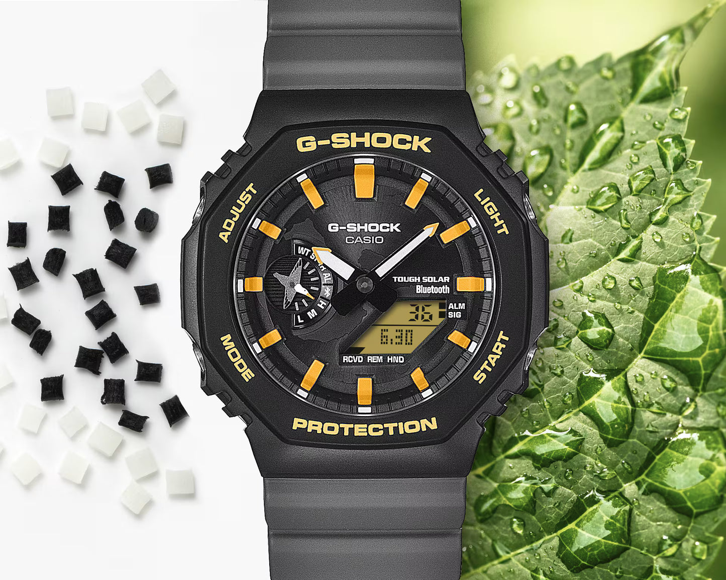 G-Shock watch with black and gray strap on a green leaf background