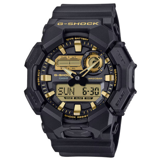Casio G-SHOCK GA010GB-1A9 – bold black-and-gold analog-digital watch with carbon core guard, bio-based resin case and band, 200m water resistance, 10-year battery, and Super Illuminator LED light.
