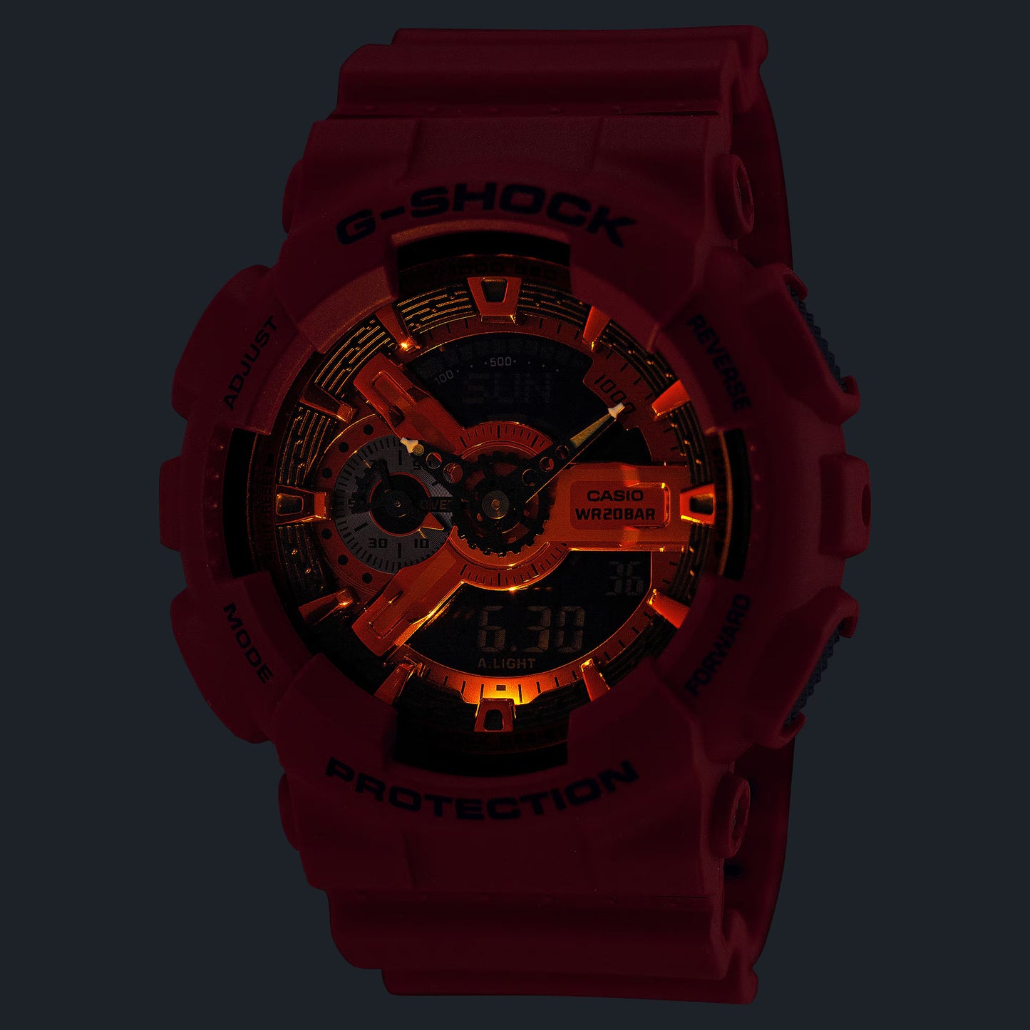 Red Casio G-Shock watch with orange accents on a black background