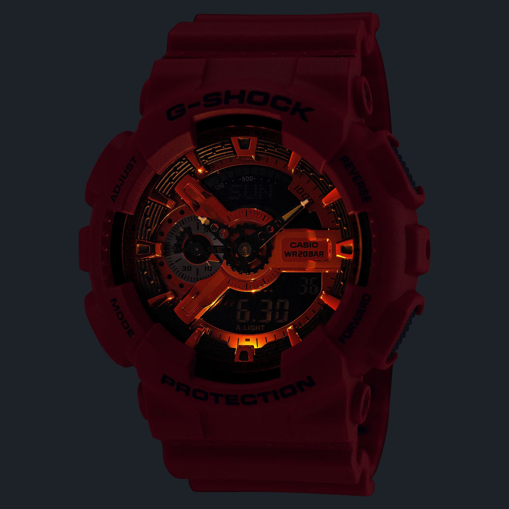 Red Casio G-Shock watch with orange accents on a black background