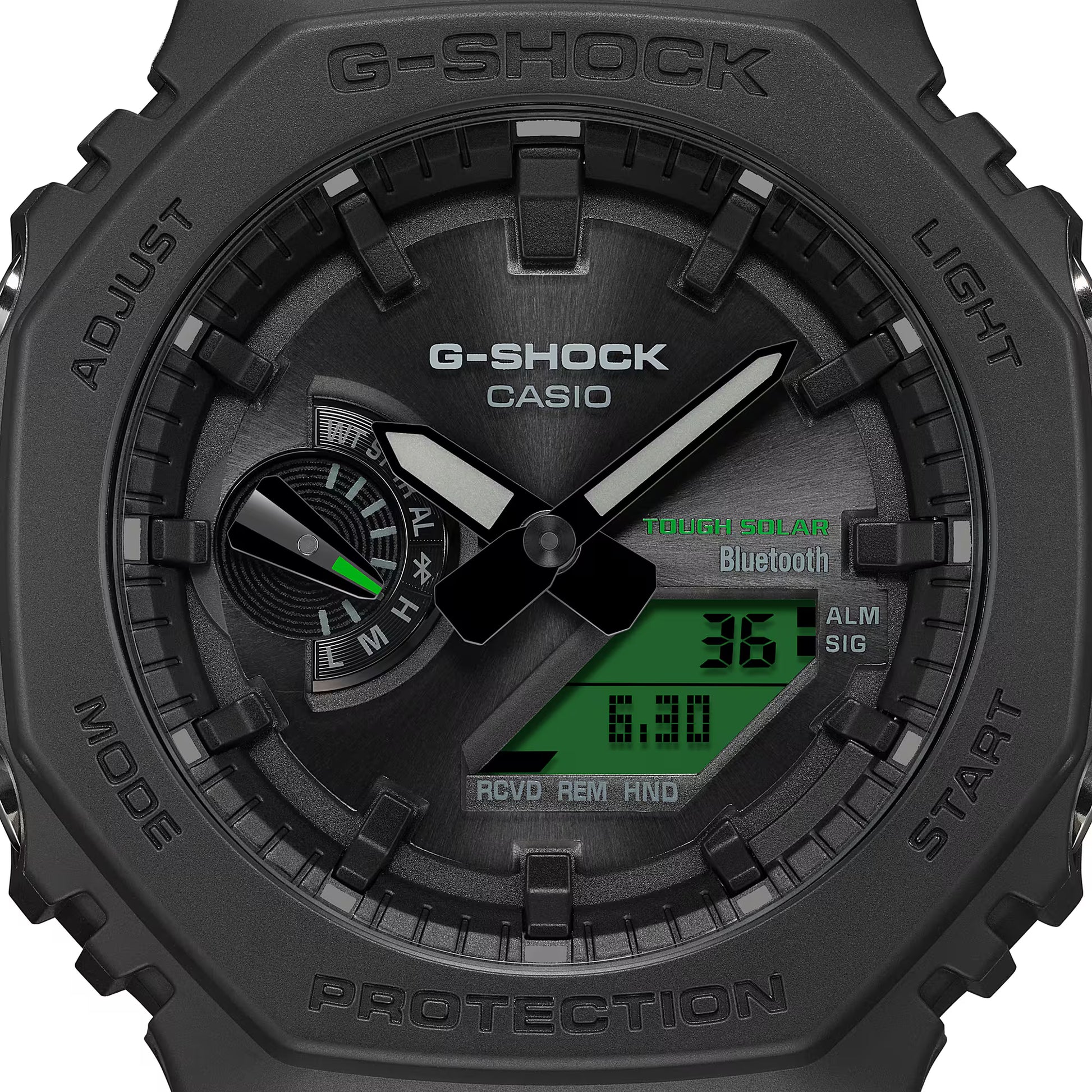 Black Casio G-Shock watch with digital and analog display on a white background
