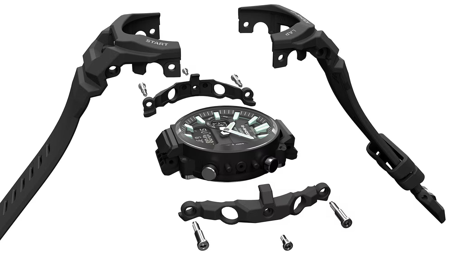 Black mechanical watch components on a white background