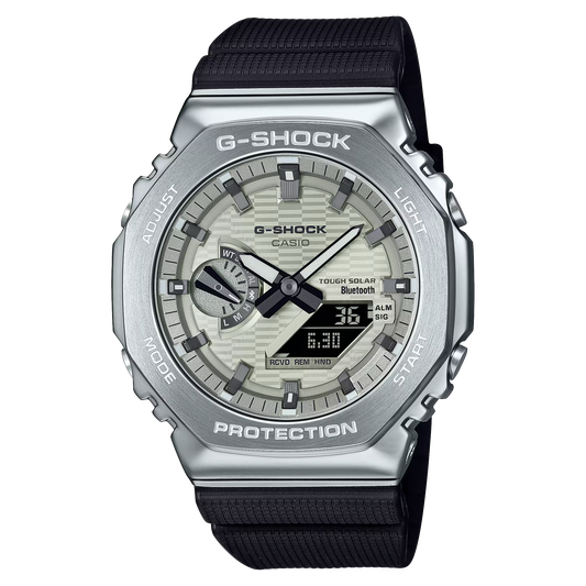 Casio G-STEEL GBM-2100A-8B men’s watch with stainless steel bezel, light yellow-gold dial, black index markers, bio-based resin case and band, Tough Solar power, Bluetooth Smartphone Link, 200m water resistance, and double LED Super Illuminator.”