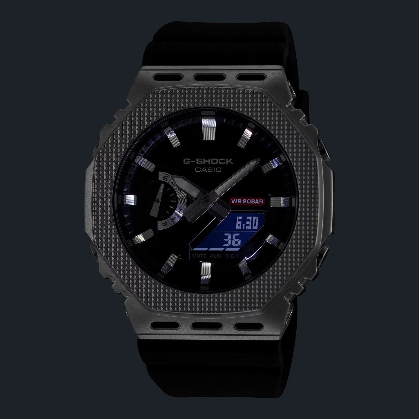 G-Shock Casio watch with black face and textured gray case on a dark background