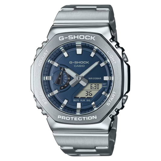 Casio G-STEEL GM2110D-2B, premium stainless-steel G-SHOCK with an octagonal bezel. Features a metallic navy-blue dial, shock resistance, 200m water resistance, dual LED Super Illuminator, and world time. Stylish and durable.