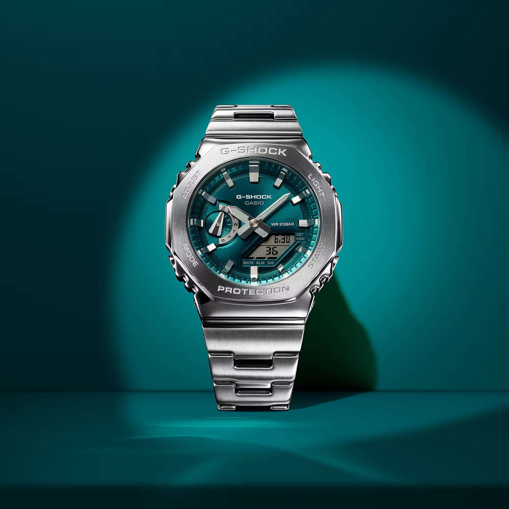 G-Shock watch with a metallic finish on a teal background