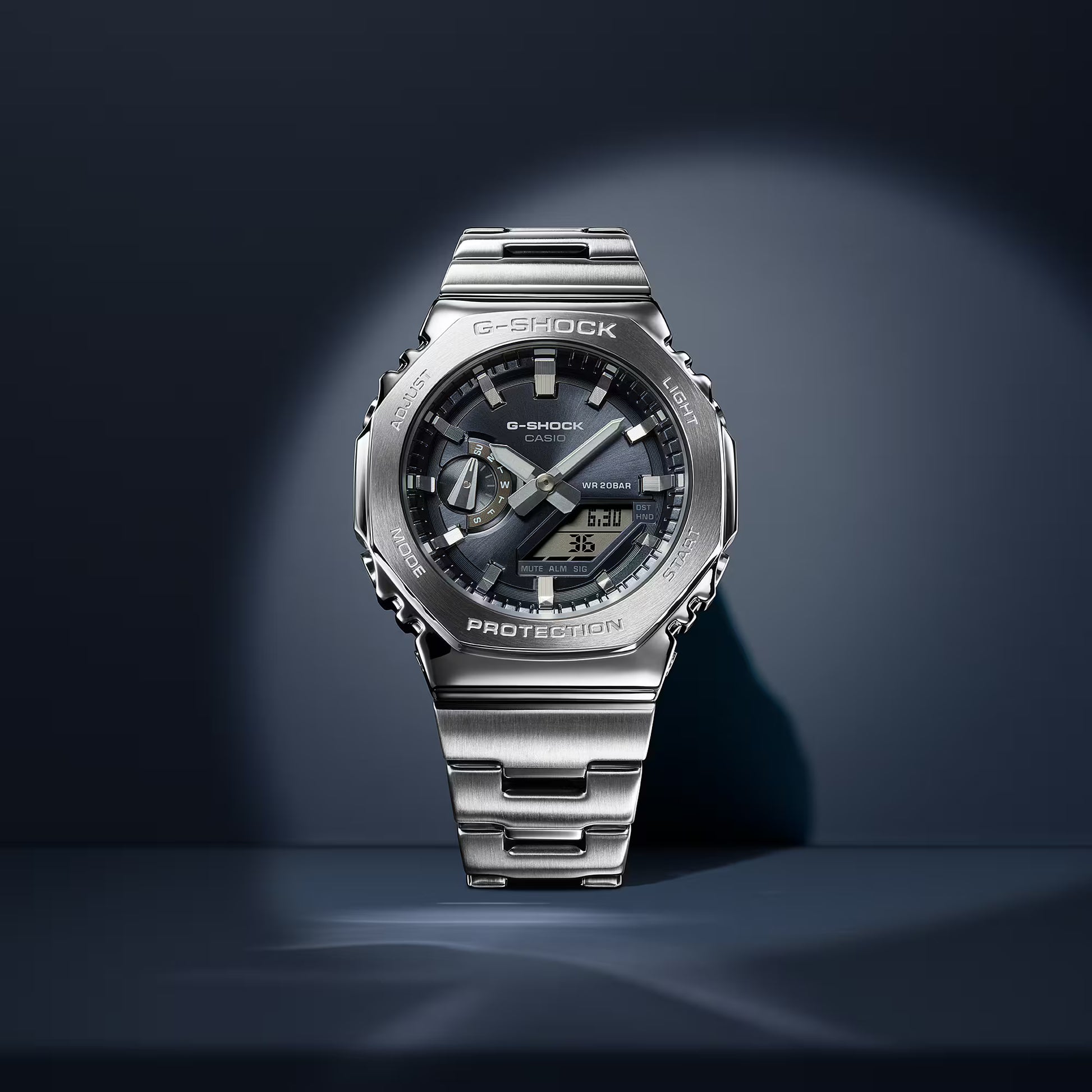 Silver Casio G-Shock watch on a dark background
