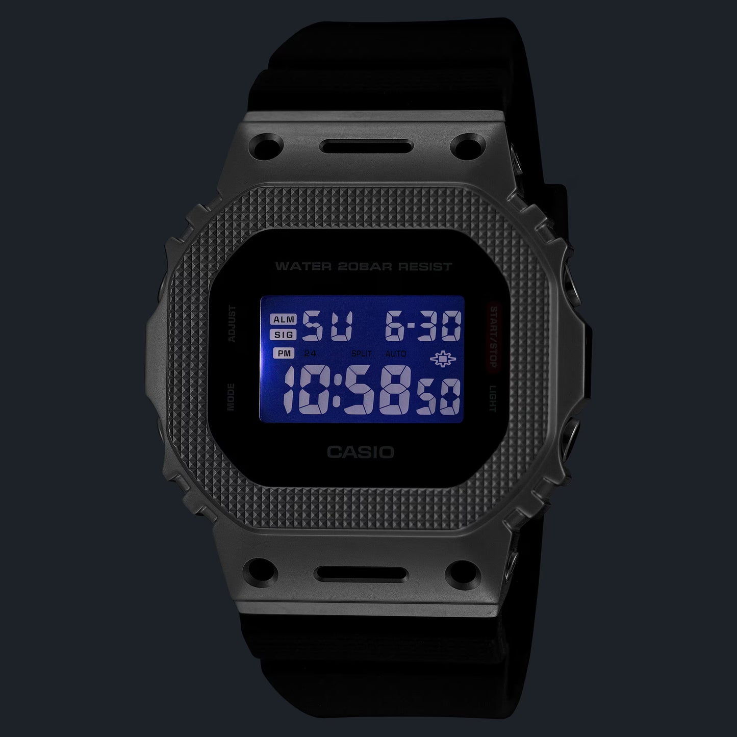 Black Casio digital watch on a black background