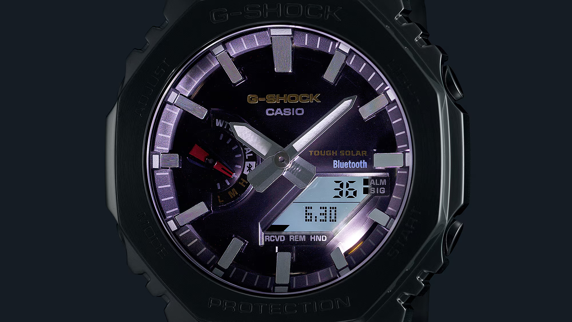 G-Shock Casio watch with black and purple design on a dark background