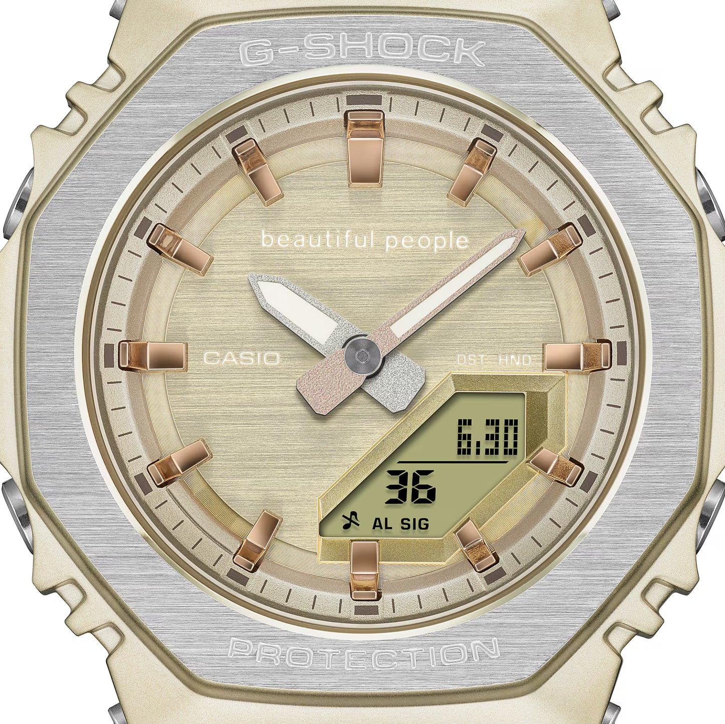Casio G-Shock watch with gold and silver design on a white background