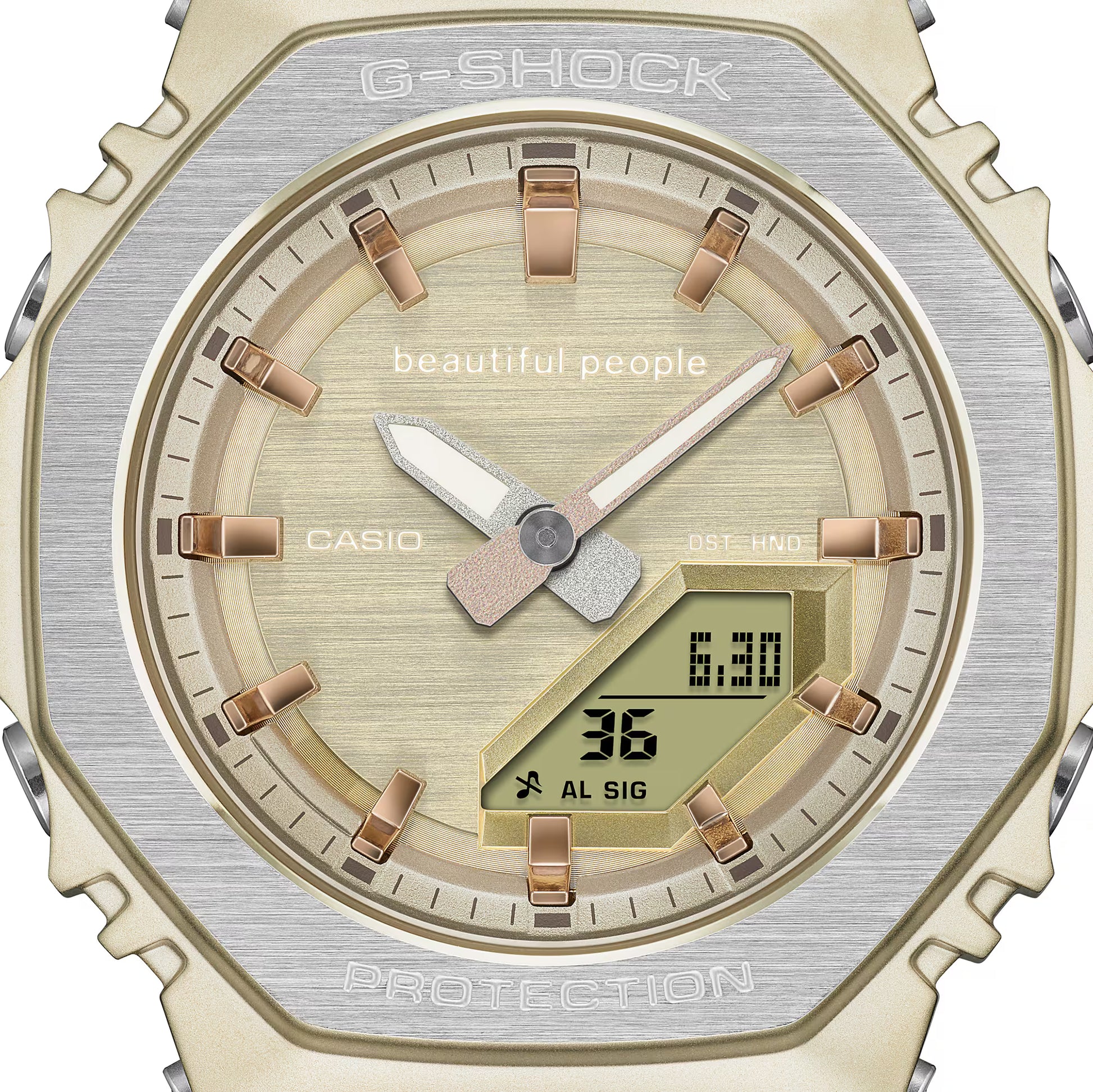 Casio G-Shock watch with gold and silver design on a white background