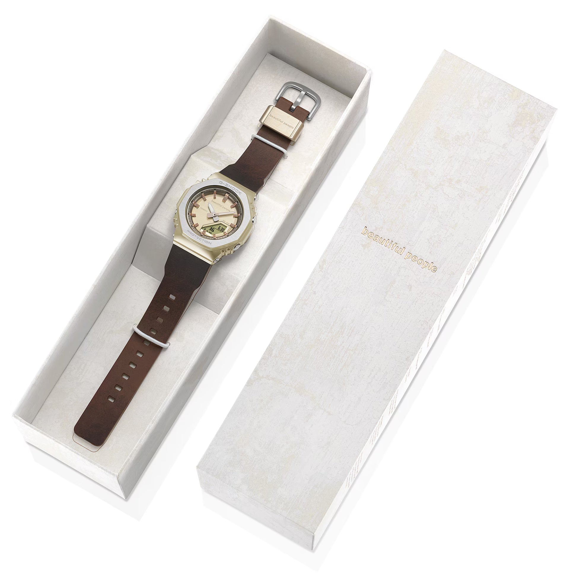 Watch with brown strap in a white box on a white background