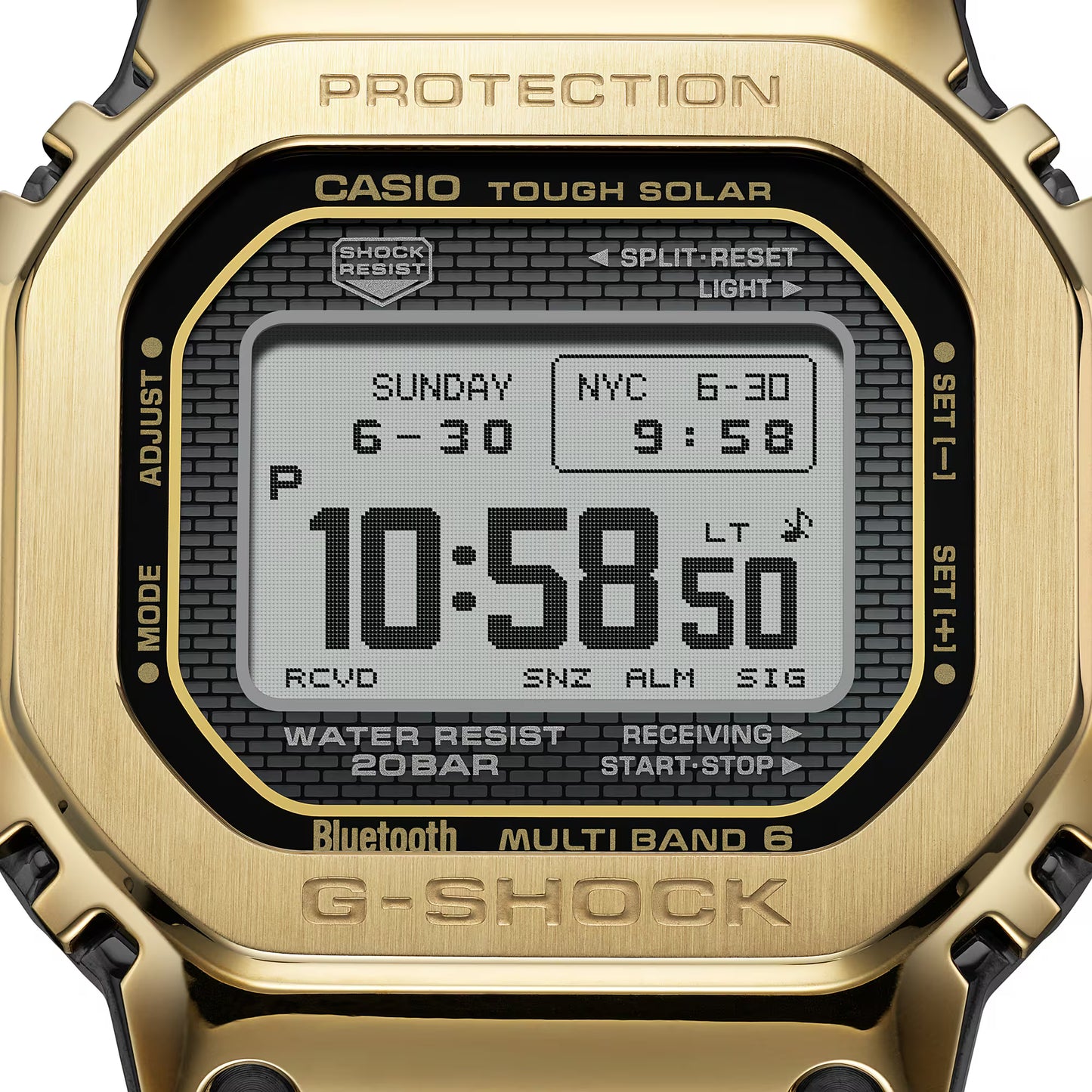 Gold Casio G-Shock watch with digital display on a white background
