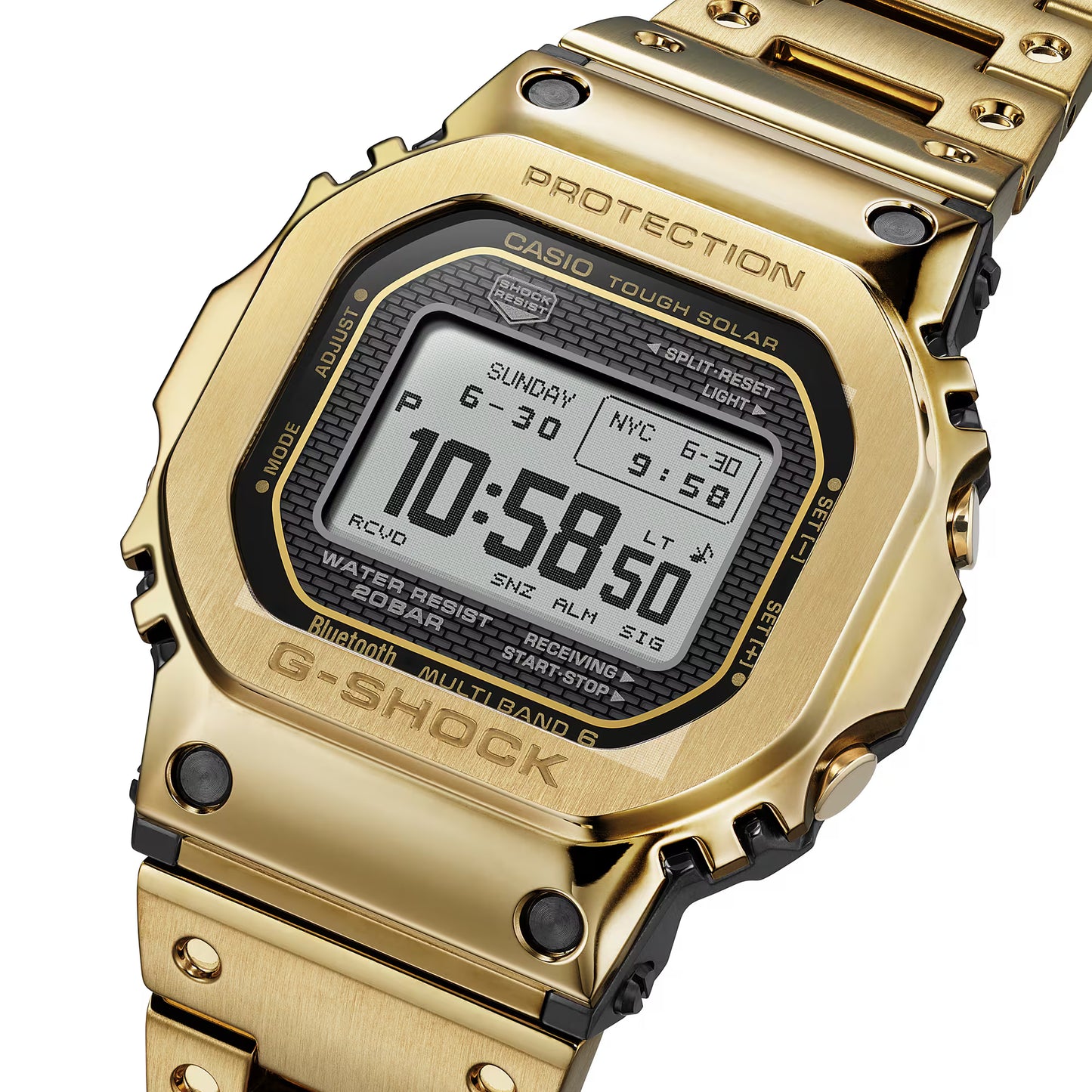 Gold Casio G-Shock watch with digital display on a white background