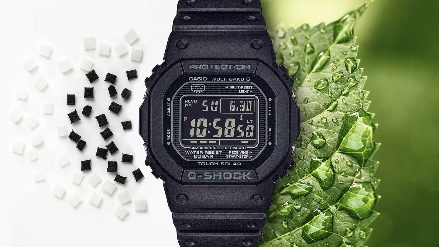Black Casio G-Shock watch on a green leaf background