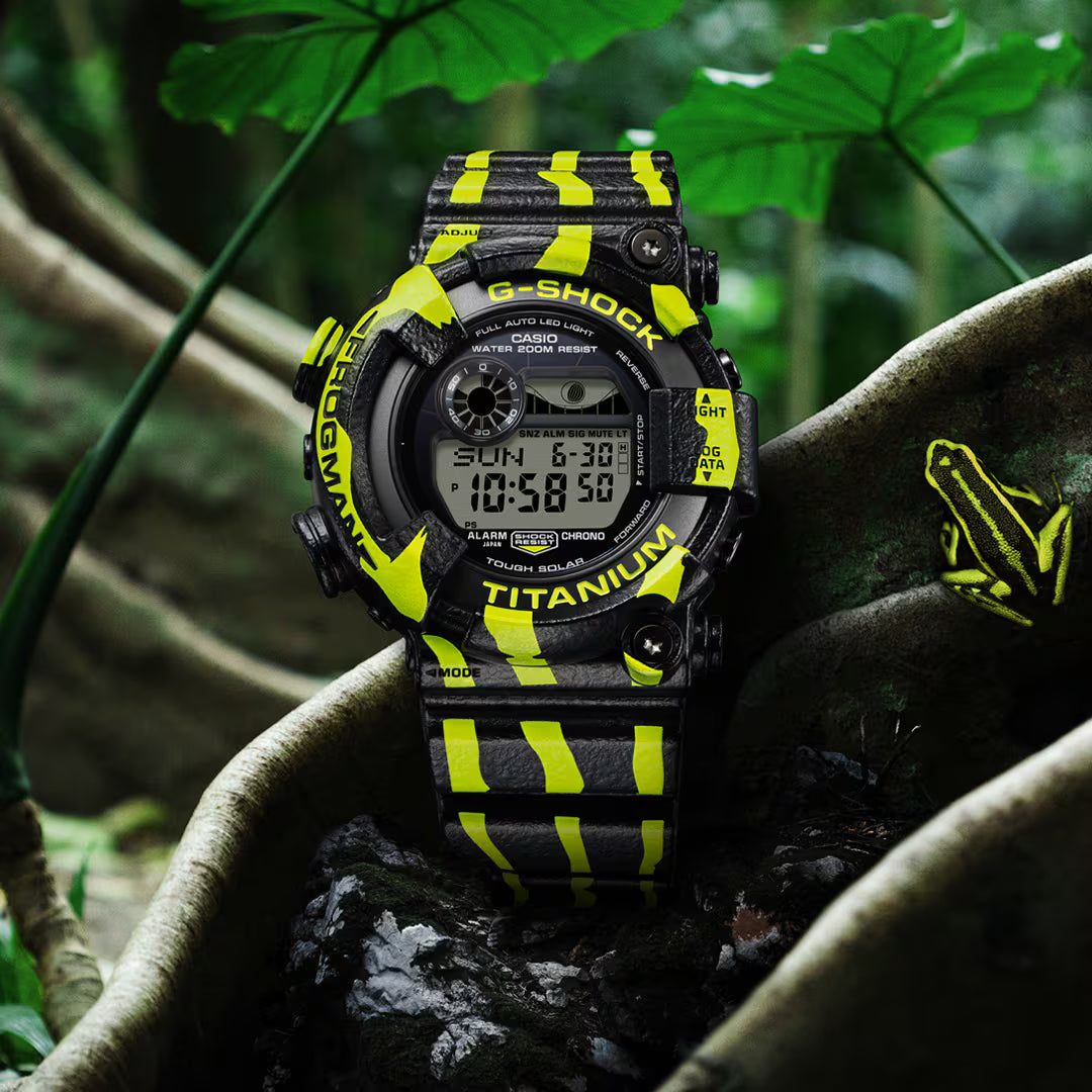G-Shock digital watch with yellow accents on a natural background