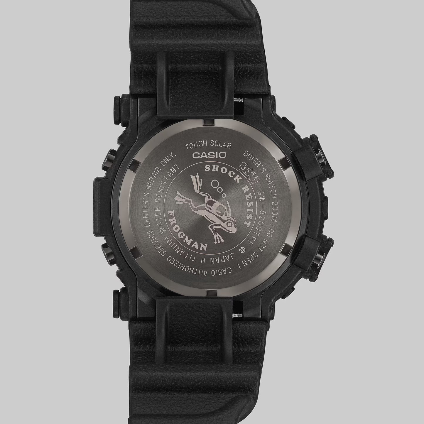 Black Casio watch with detailed branding on a gray background
