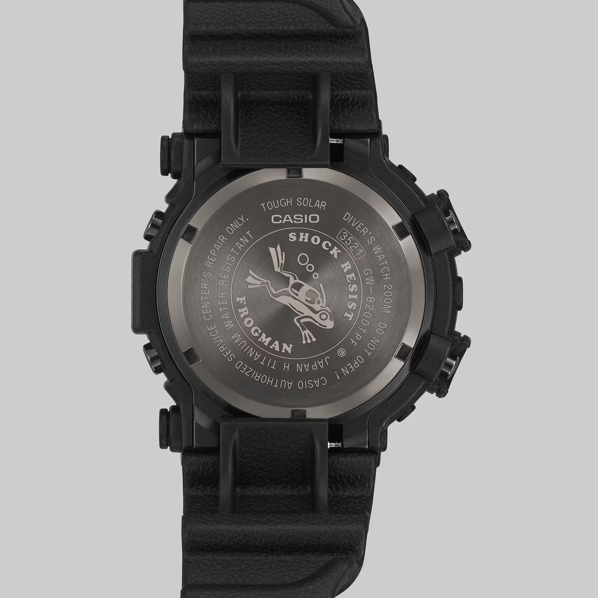 Black Casio watch with detailed branding on a gray background