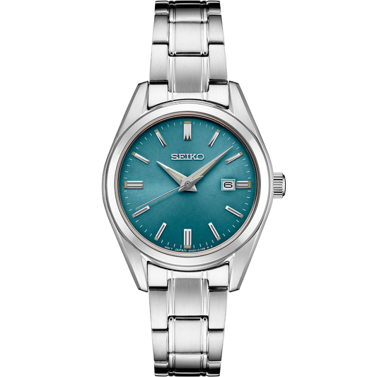 Seiko SUR531 Essentials quartz watch with blue sunray dial, stainless steel case and bracelet, date display, sapphire crystal, and compact 29.8mm size.