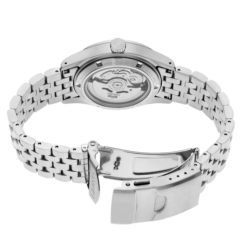 Silver stainless steel watch band and case back with a visible automatic movement, shown on a plain white background.