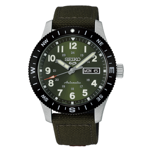 Seiko 5 Sports HDB008 Field Series automatic watch with khaki green earth-tone Arabic-numeral dial, 41mm stainless steel case, compass-style rotating bezel, nylon strap with leather detailing, LumiBrite details, day-date display, and Caliber 4R36 movement.