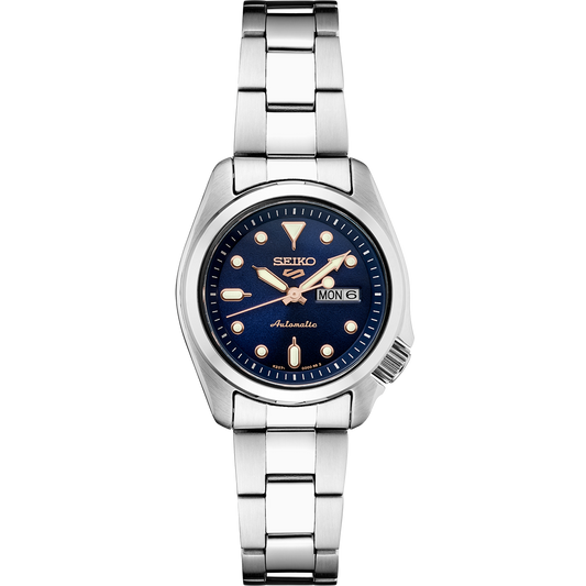 Seiko 5 Sports SRE003 automatic watch with navy blue sunray dial, luminous hands and markers, stainless steel case and bracelet, and compact vintage-inspired design.
