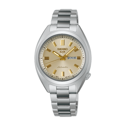 Seiko SRE023 Seiko 5 Sports SNXS automatic watch with champagne dial, gold-tone hands and indices, day-date display, and compact 32mm stainless steel case with bracelet.