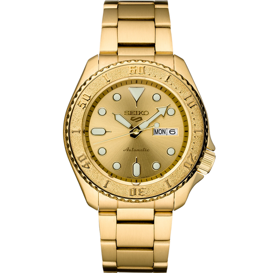 Seiko 5 Sports SRPE74 automatic watch with a metallic gold-tone dial, gold-finished stainless steel case and bracelet, unidirectional rotating bezel, and day-date display.