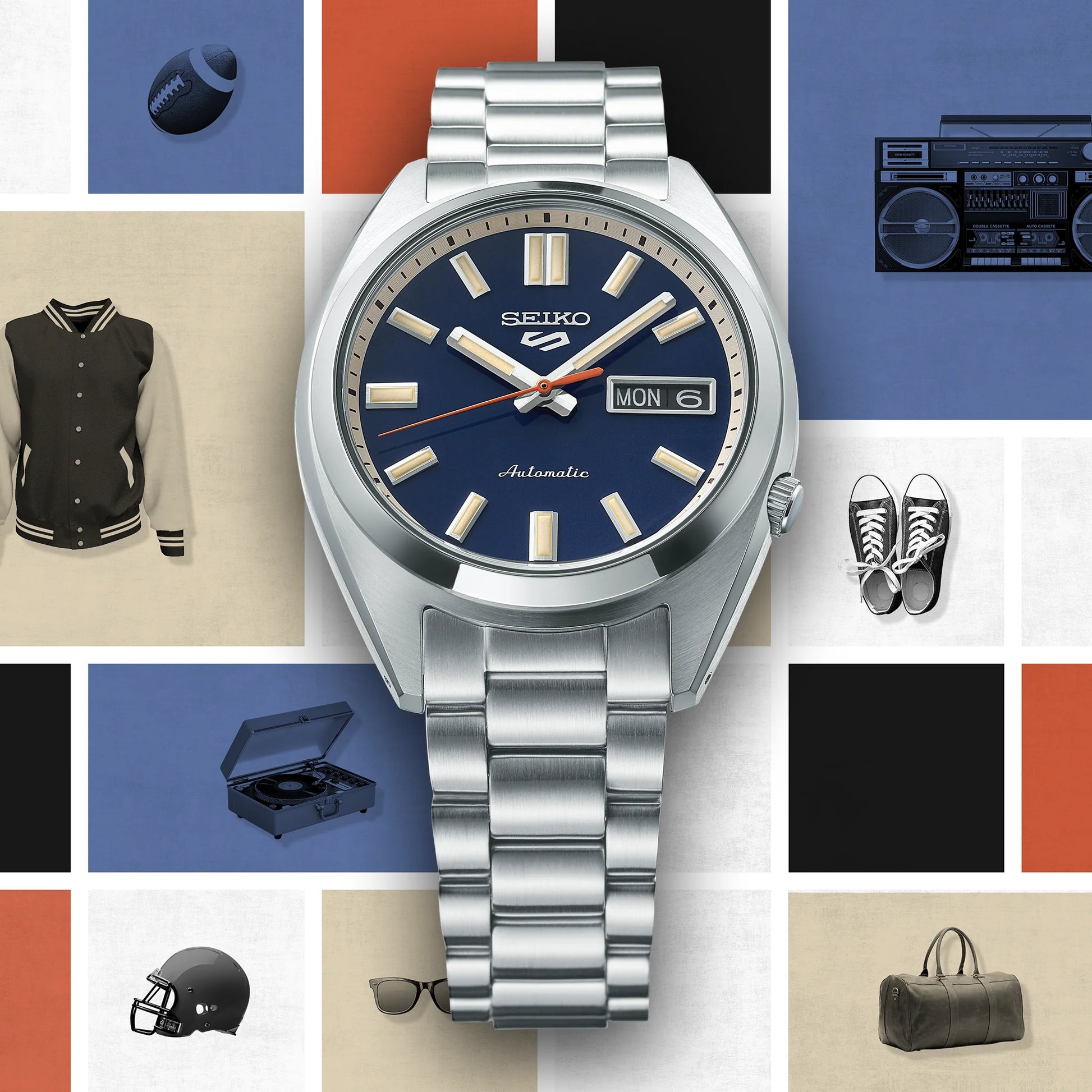SEIKO SRPK87 from the Seiko 5 Sports collection – compact stainless steel case, deep blue dial with metallic accents, day/date display, automatic movement, and 100m water resistance.