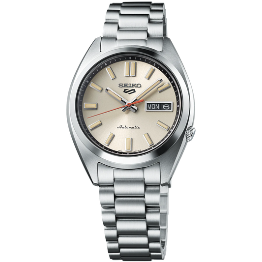 Seiko SRPK91 – ivory dial automatic watch from Seiko 5 Sports with diamond-cut indices, curved Hardlex crystal, see-through caseback, and 100m water resistance.