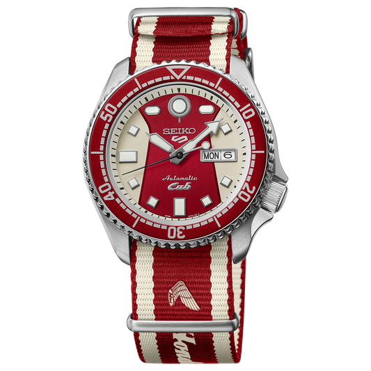 Seiko watch with red and white striped strap on a white background