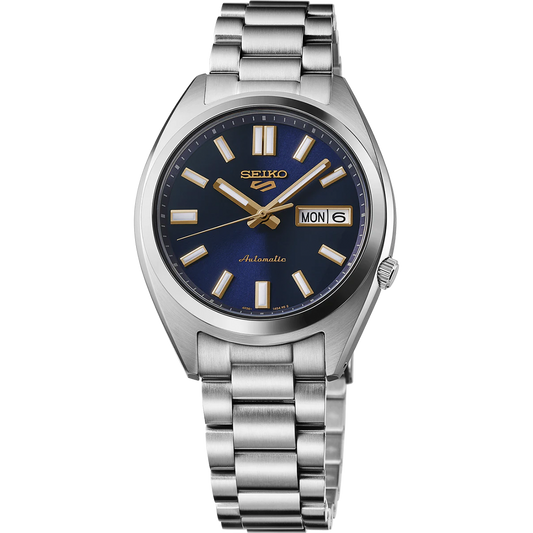 Seiko 5 Sports SRPL55 automatic watch with a 37.4 mm stainless steel case, deep blue sunray dial, and gold-tone diamond-cut indices. Features day/date display, LumiBrite-coated hands, curved Hardlex crystal, and stainless steel bracelet with tri-fold push button clasp. Powered by Caliber 4R36 automatic movement with manual winding, 24 jewels, 41-hour power reserve, and screwdown see-through caseback. Water resistant to 100 meters (10 bar).