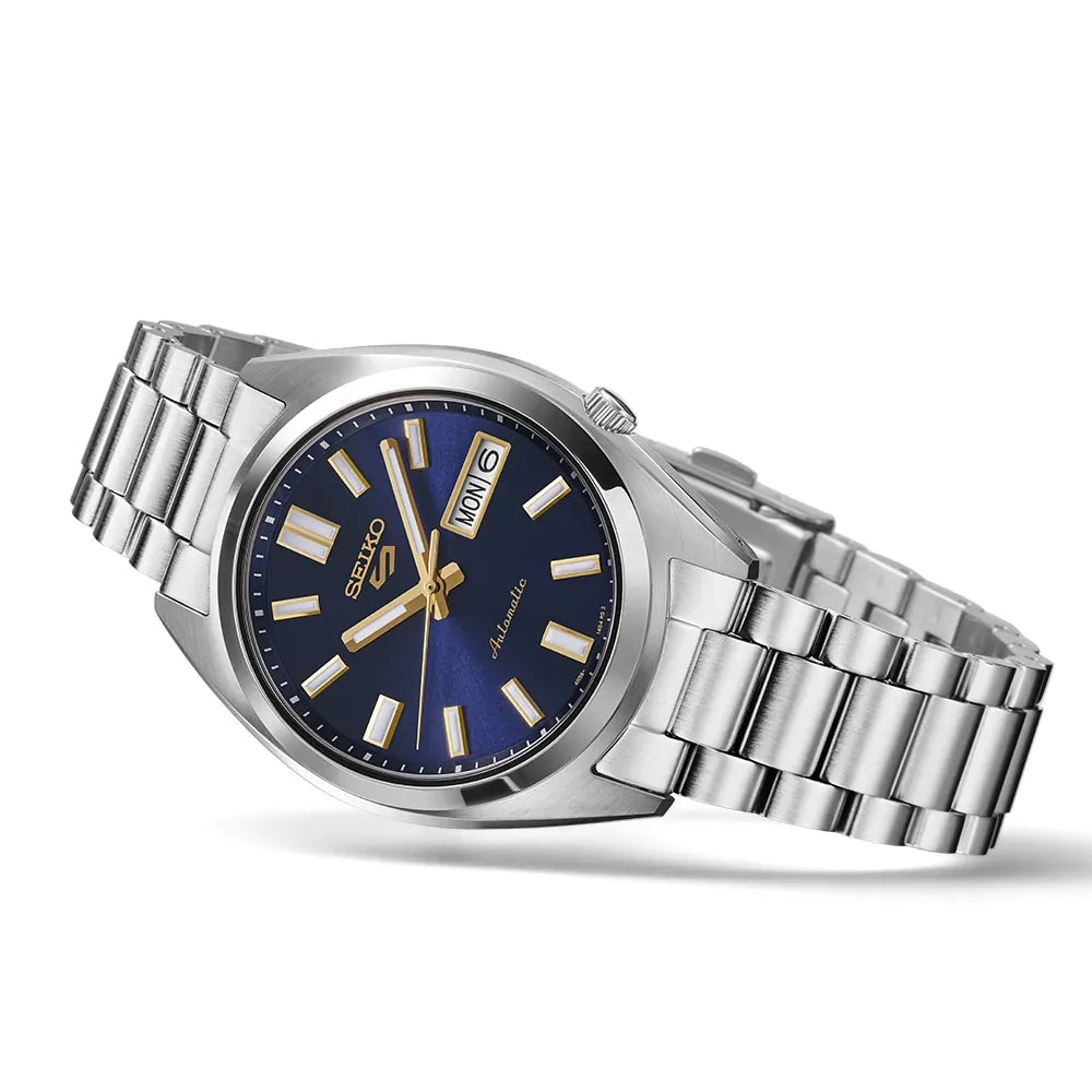 Silver Seiko watch with blue dial on a white background
