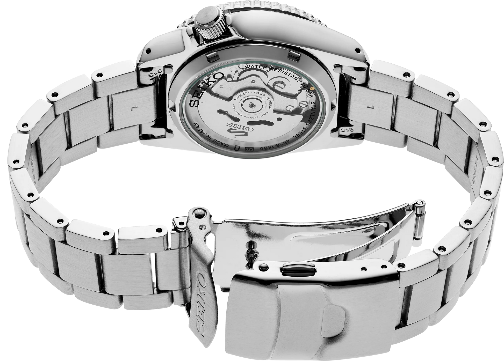 Silver Seiko watch with open caseback on a white background