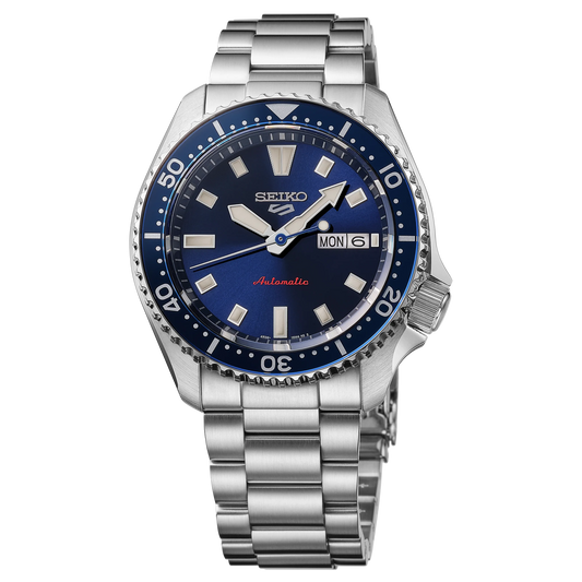 SEIKO 5 Sports SRPL83 SKX Sports Style – deep blue dial and bezel, stainless steel bracelet, automatic movement, and 100m water resistance.