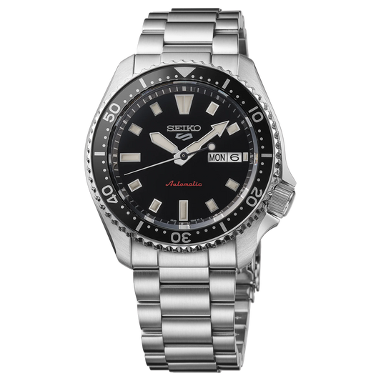 SEIKO 5 Sports SRPL85 SKX Sports Style – black dial and bezel, stainless steel bracelet, automatic movement, and 100m water resistance.