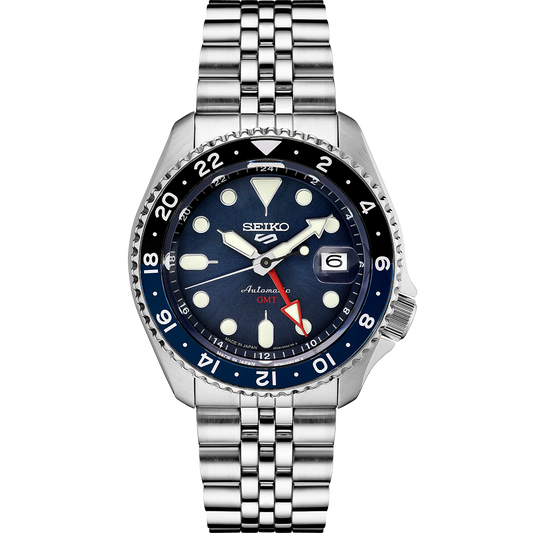 Seiko 5 Sports SSK003 automatic GMT watch with a blue dial, blue and black 24-hour GMT bezel, luminous hands and markers, stainless steel case and bracelet, and SKX sports-style design.