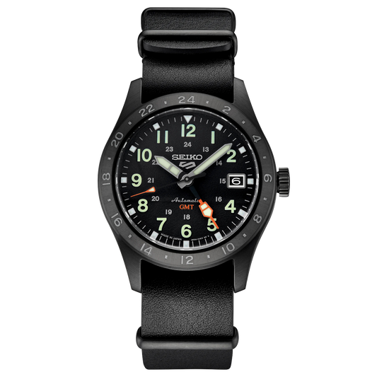 Black Seiko watch with a detailed face on a white background