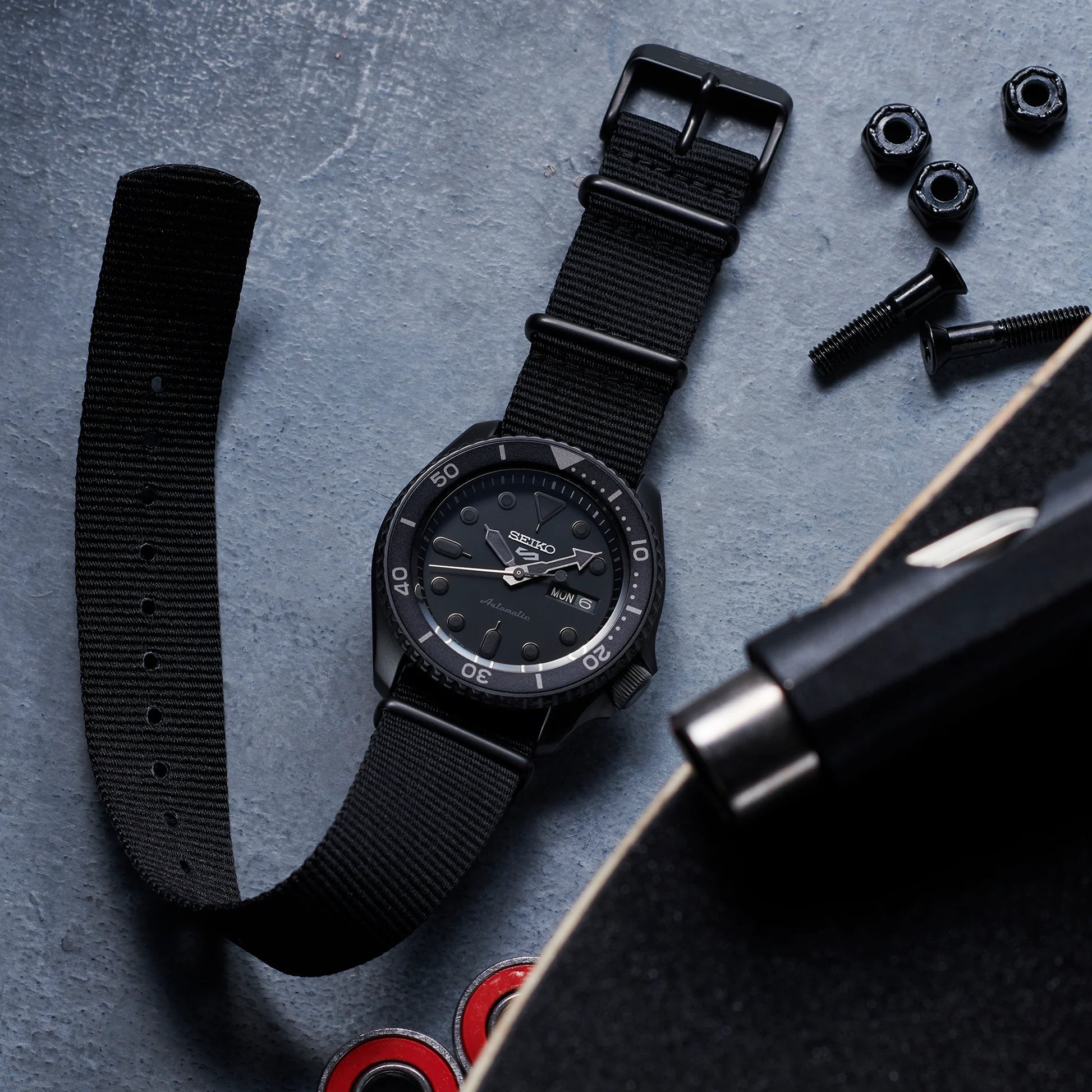 SEIKO 5 Sports SRPD79 Automatic Watch – All-Black Design with Nylon Strap, 42.5mm Case, Day-Date, 100M Water Resistant