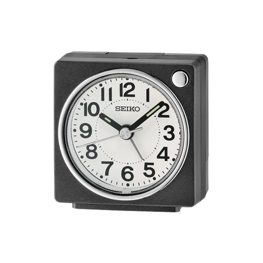 SEIKO QHE196KLH black compact bedside alarm clock with white analog dial, bold black Arabic numerals, LumiBrite-tipped hands, and square case.